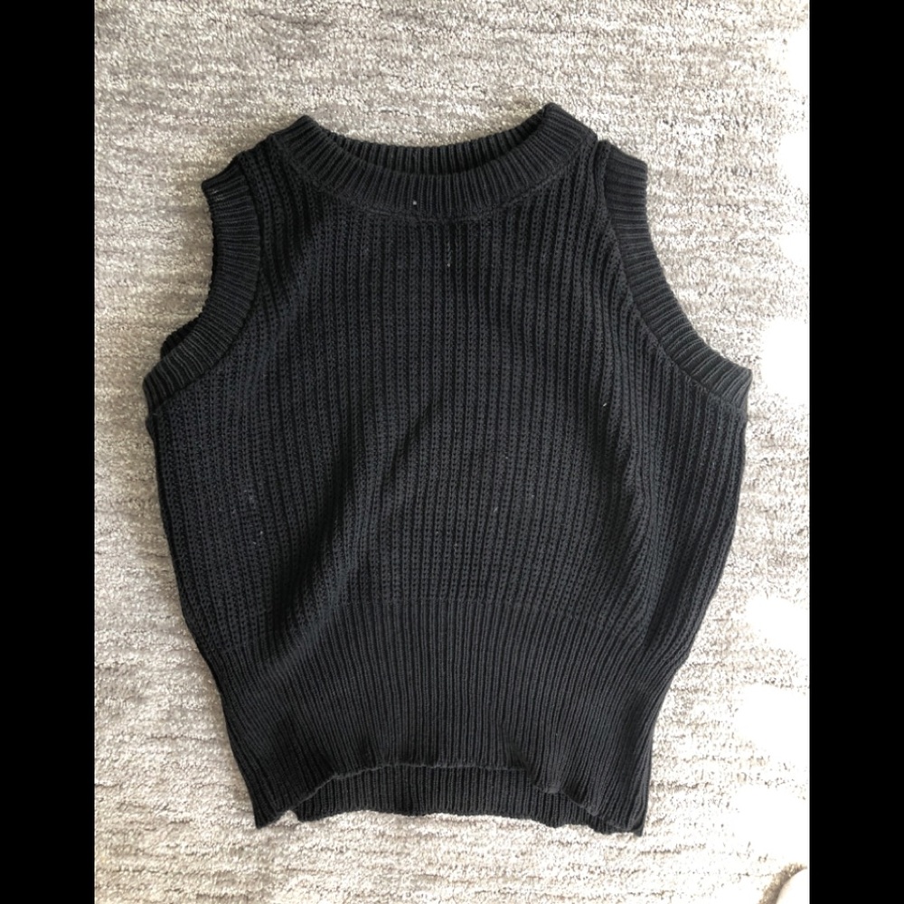 Sleeveless black sweater